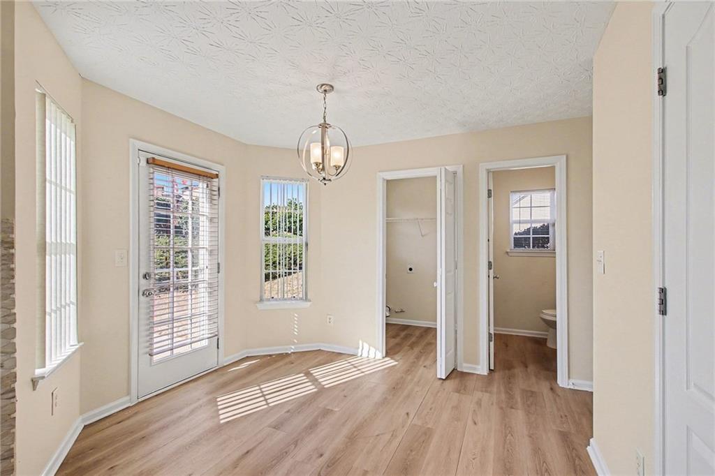 110 Pendergrass Farms Circle Pendergrass, GA 30567 - Photo 12 of 33 a view of empty room with wooden floor and fan