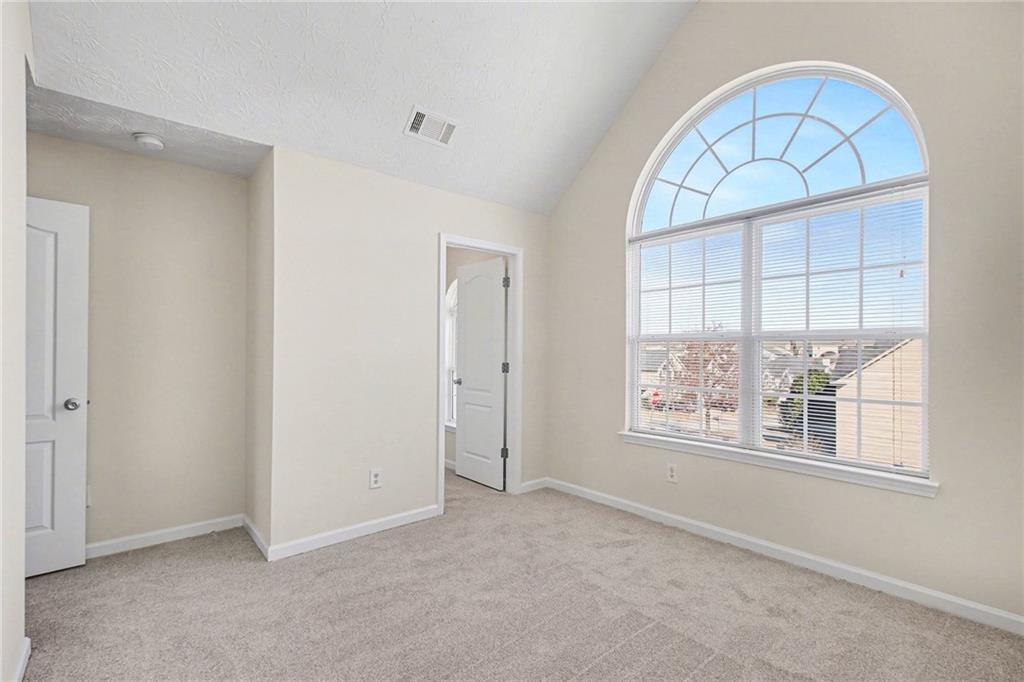 110 Pendergrass Farms Circle Pendergrass, GA 30567 - Photo 19 of 33 an empty room with windows and closet