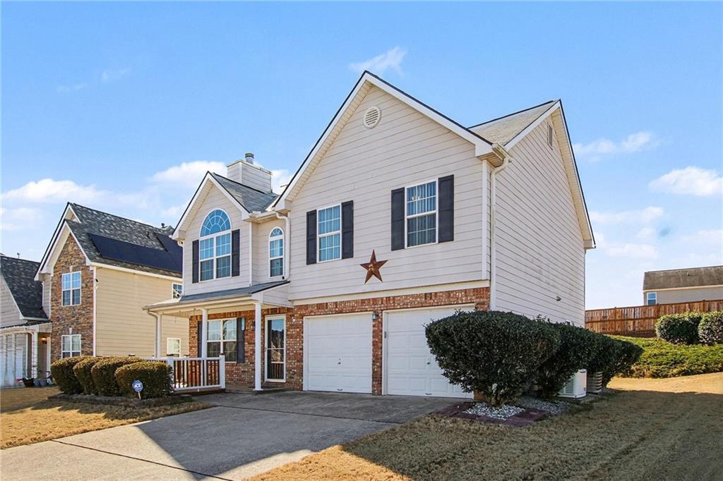 110 Pendergrass Farms Circle Pendergrass, GA 30567 - Photo 2 of 33 a front view of a house with a yard