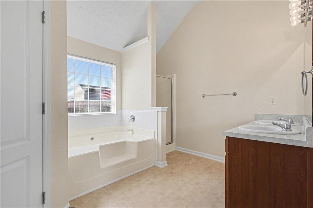 110 Pendergrass Farms Circle Pendergrass, GA 30567 - Photo 22 of 33 a bathroom with a sink and a bathtub