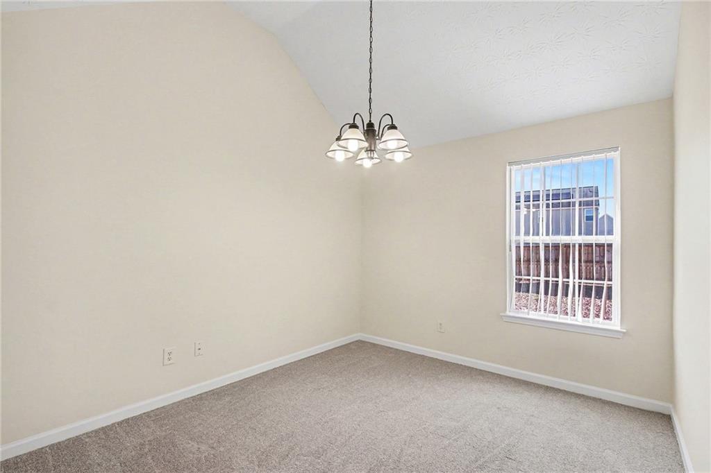 110 Pendergrass Farms Circle Pendergrass, GA 30567 - Photo 24 of 33 wooden floor in an empty room with a window
