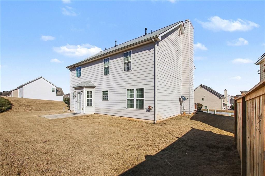 110 Pendergrass Farms Circle Pendergrass, GA 30567 - Photo 32 of 33 a view of a house with backyard and a tree