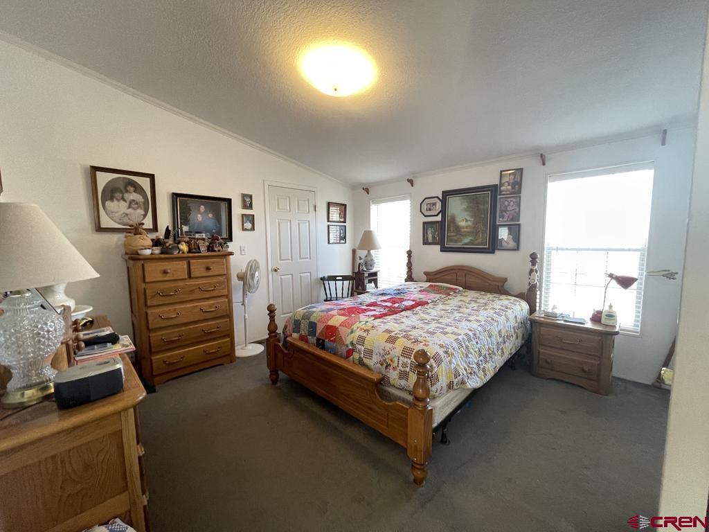 12383 Rd M Cahone, CO 81320 - Photo 25 of 42 a bedroom with a bed and a window