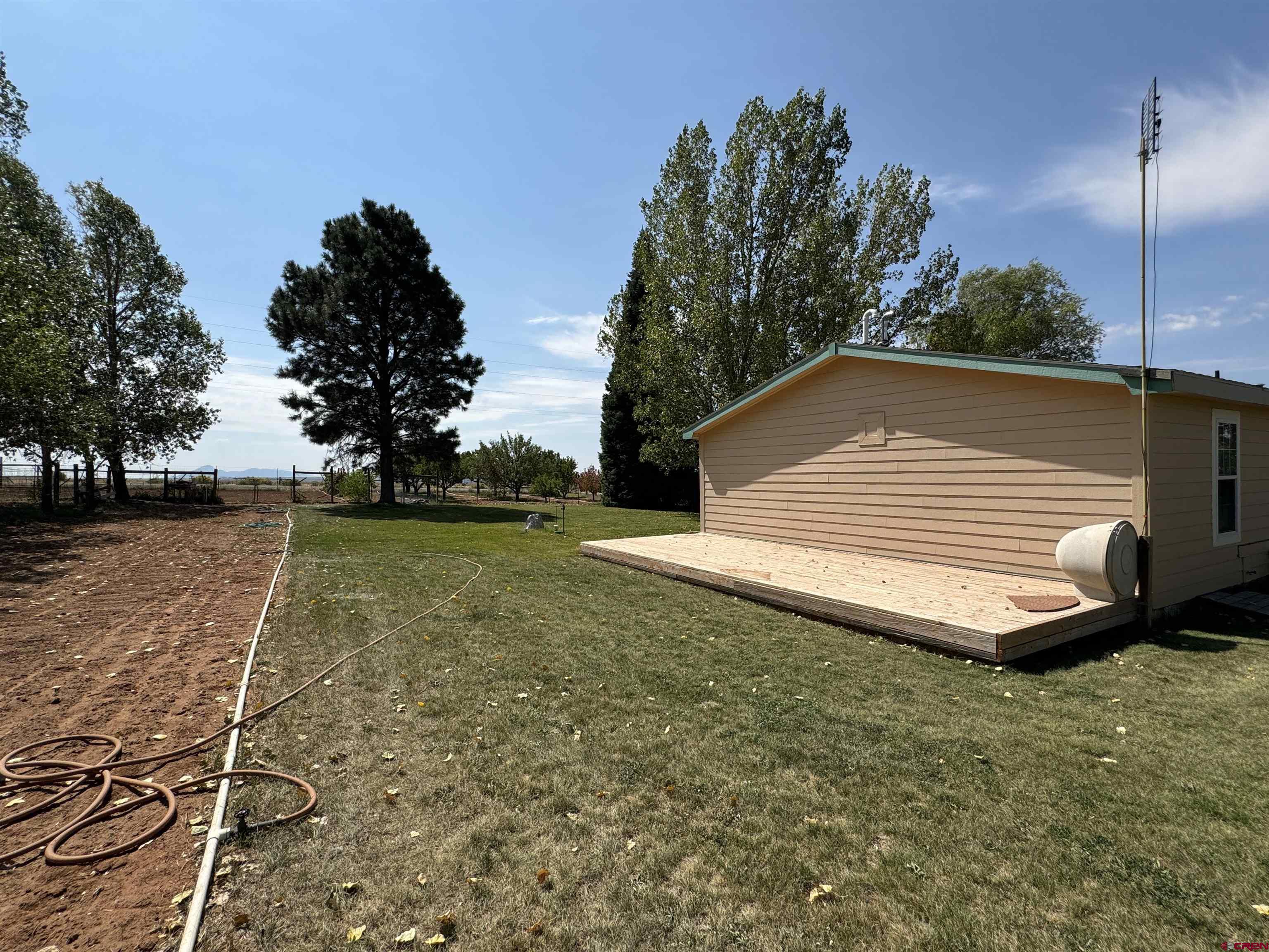 12383 Rd M Cahone, CO 81320 - Photo 3 of 42 a view of backyard with green space