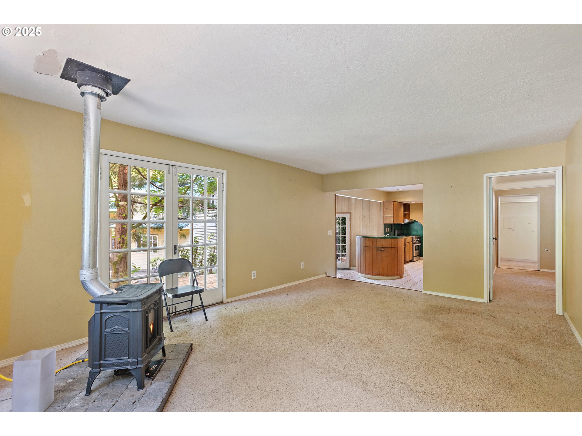 6131 Northwest Thompson Road Portland, OR 97210 - Photo 17 of 48 a view of a livingroom with furniture and a window