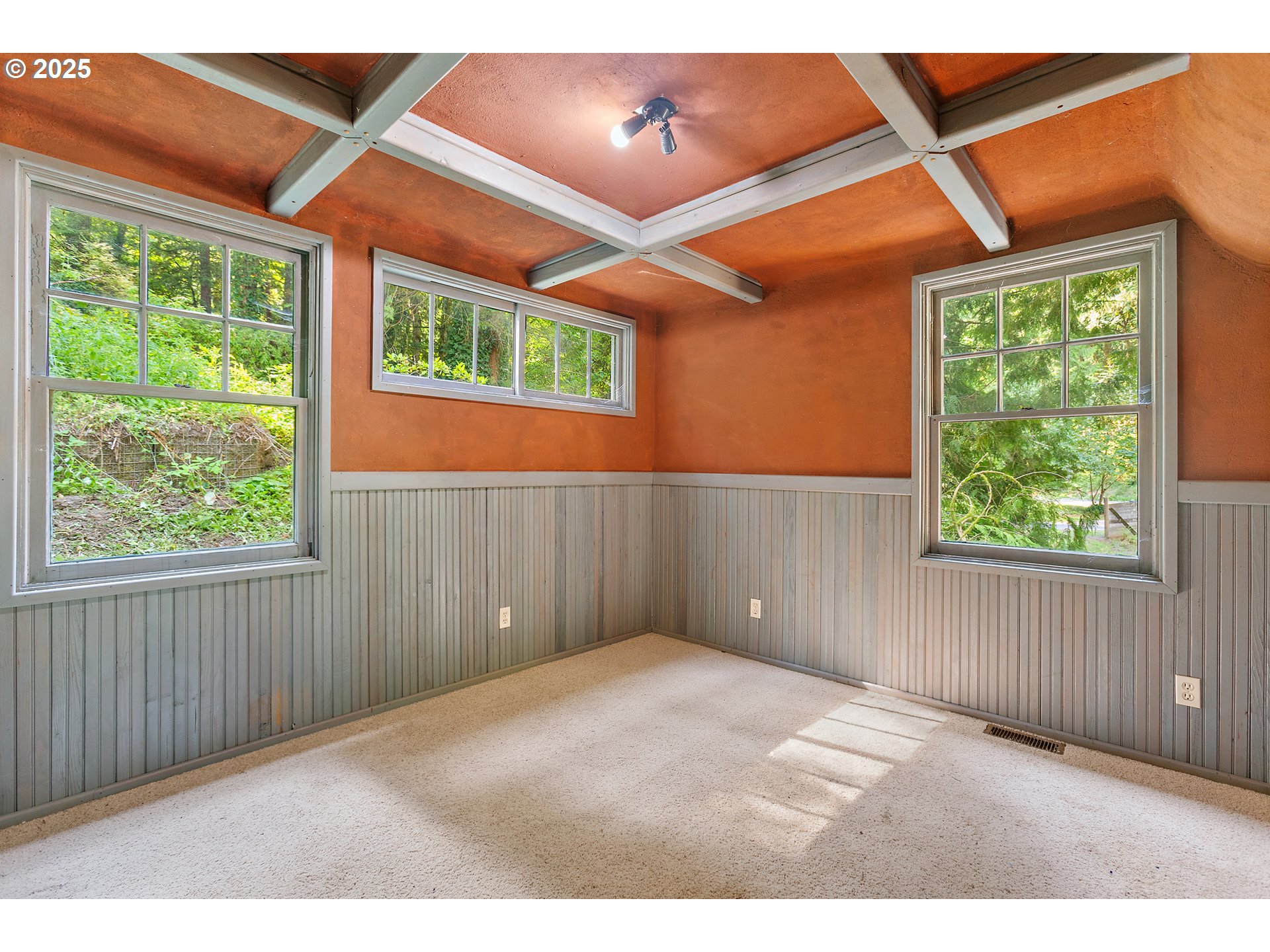 6131 Northwest Thompson Road Portland, OR 97210 - Photo 19 of 48 an empty room with windows