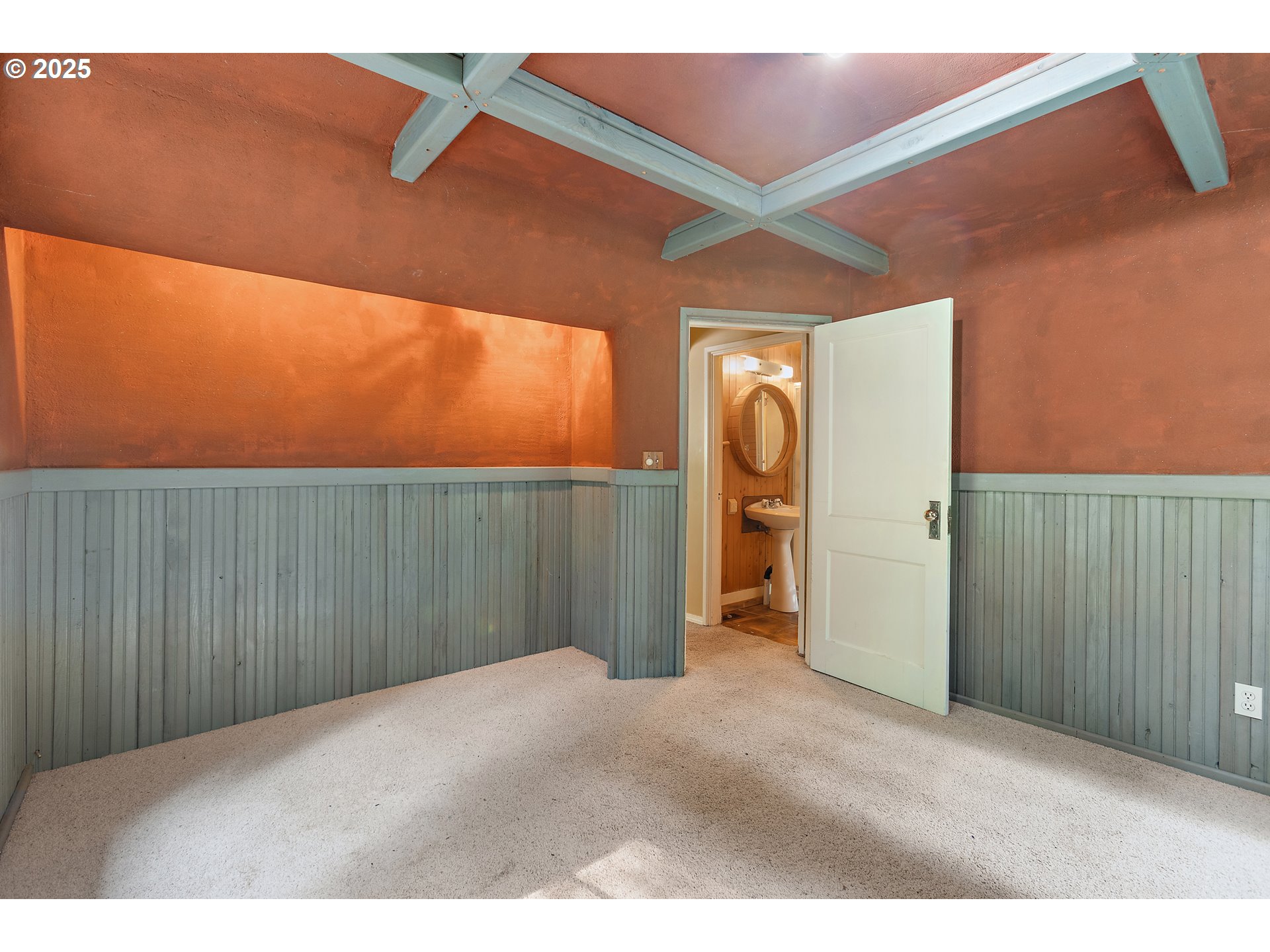 6131 Northwest Thompson Road Portland, OR 97210 - Photo 20 of 48 a view of a livingroom with bathroom and staircase