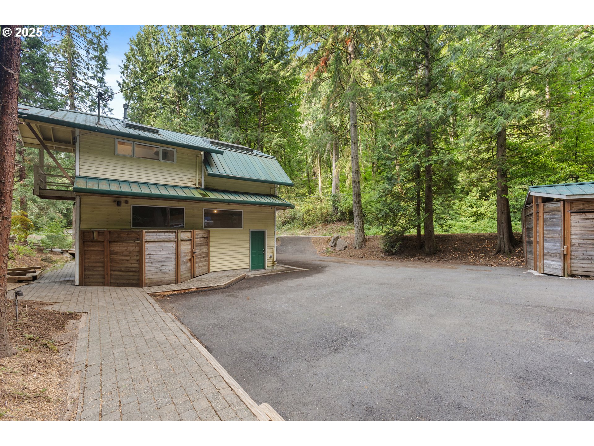 6131 Northwest Thompson Road Portland, OR 97210 - Photo 27 of 48 a view of a house with a outdoor space