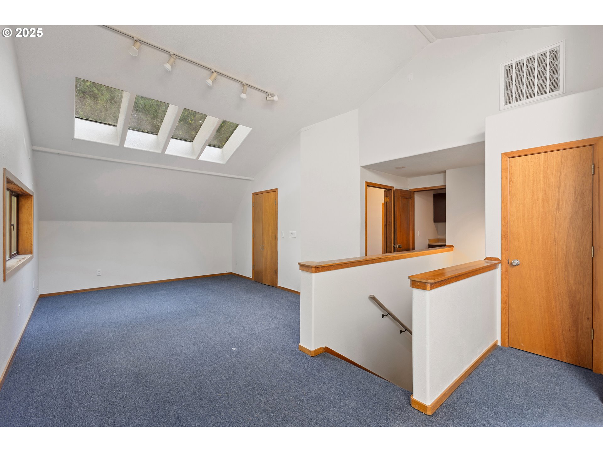 6131 Northwest Thompson Road Portland, OR 97210 - Photo 31 of 48 a view of an empty room with a window