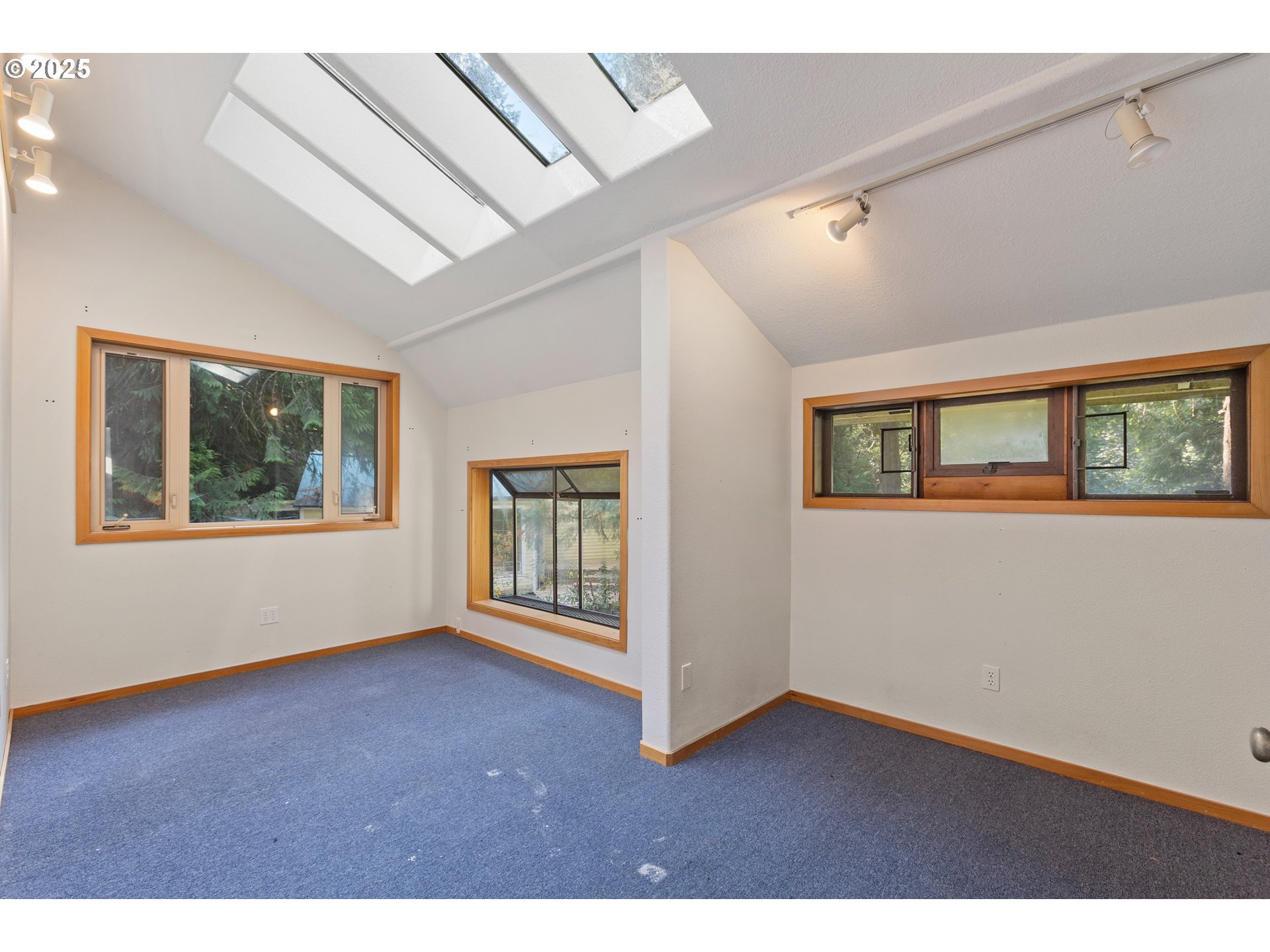 6131 Northwest Thompson Road Portland, OR 97210 - Photo 35 of 48 a view of an empty room with a window