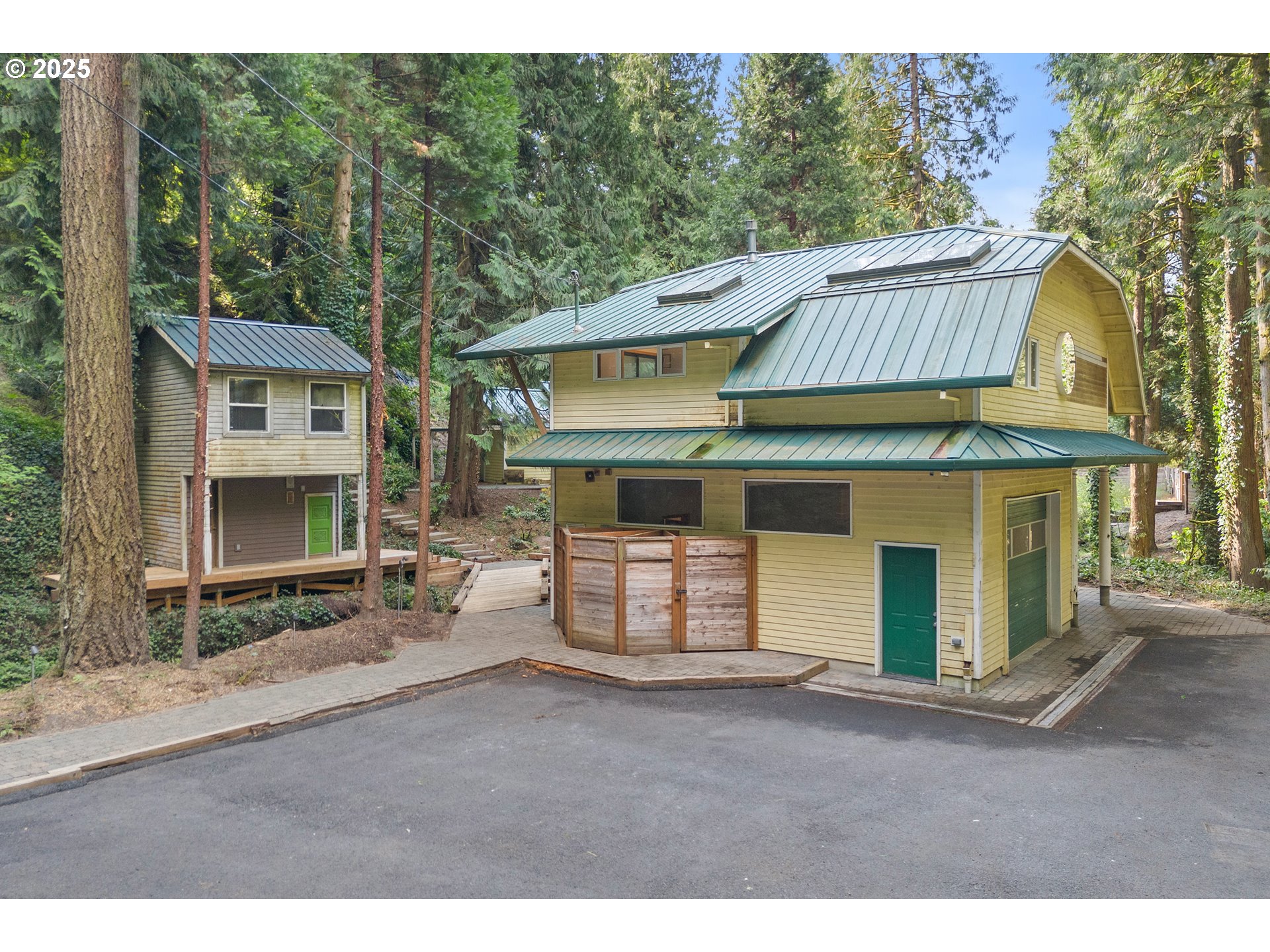 6131 Northwest Thompson Road Portland, OR 97210 - Photo 40 of 48 a view of a house with a sink and outdoor space
