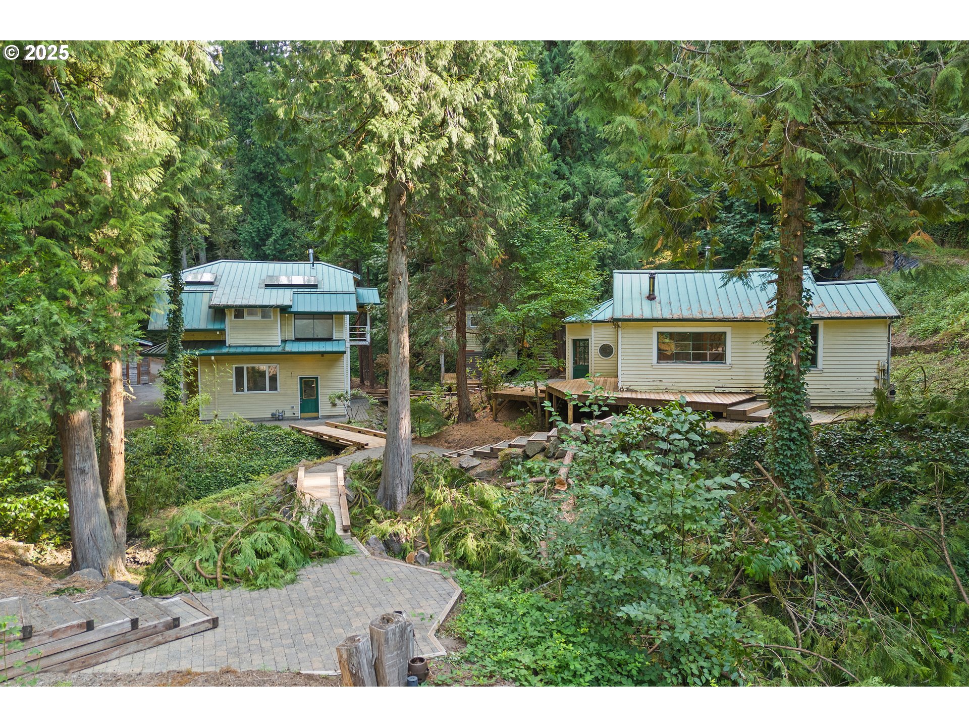 6131 Northwest Thompson Road Portland, OR 97210 - Photo 4 of 48 a view of a house with a outdoor space