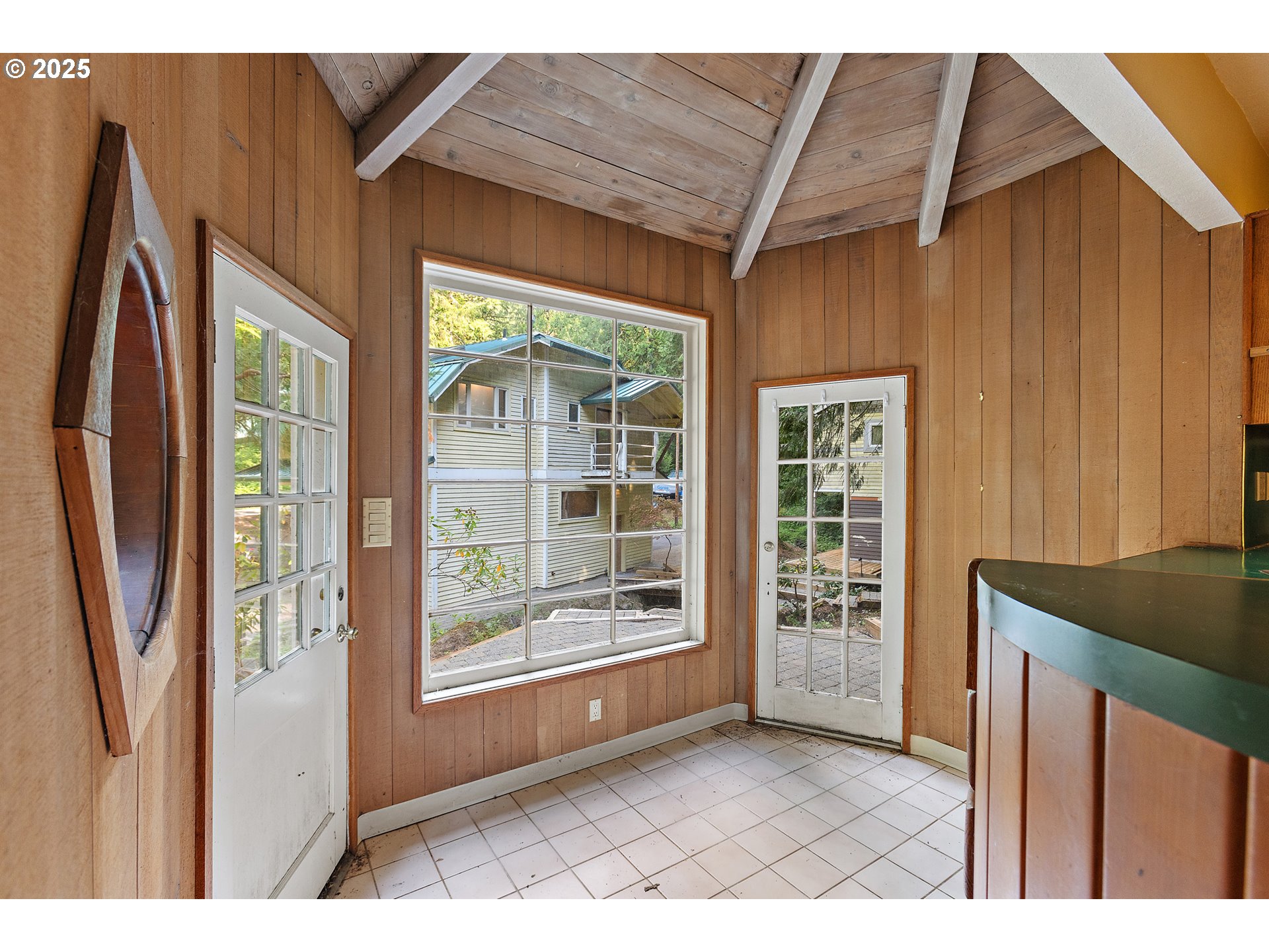6131 Northwest Thompson Road Portland, OR 97210 - Photo 8 of 48 a view of a room that has a large window