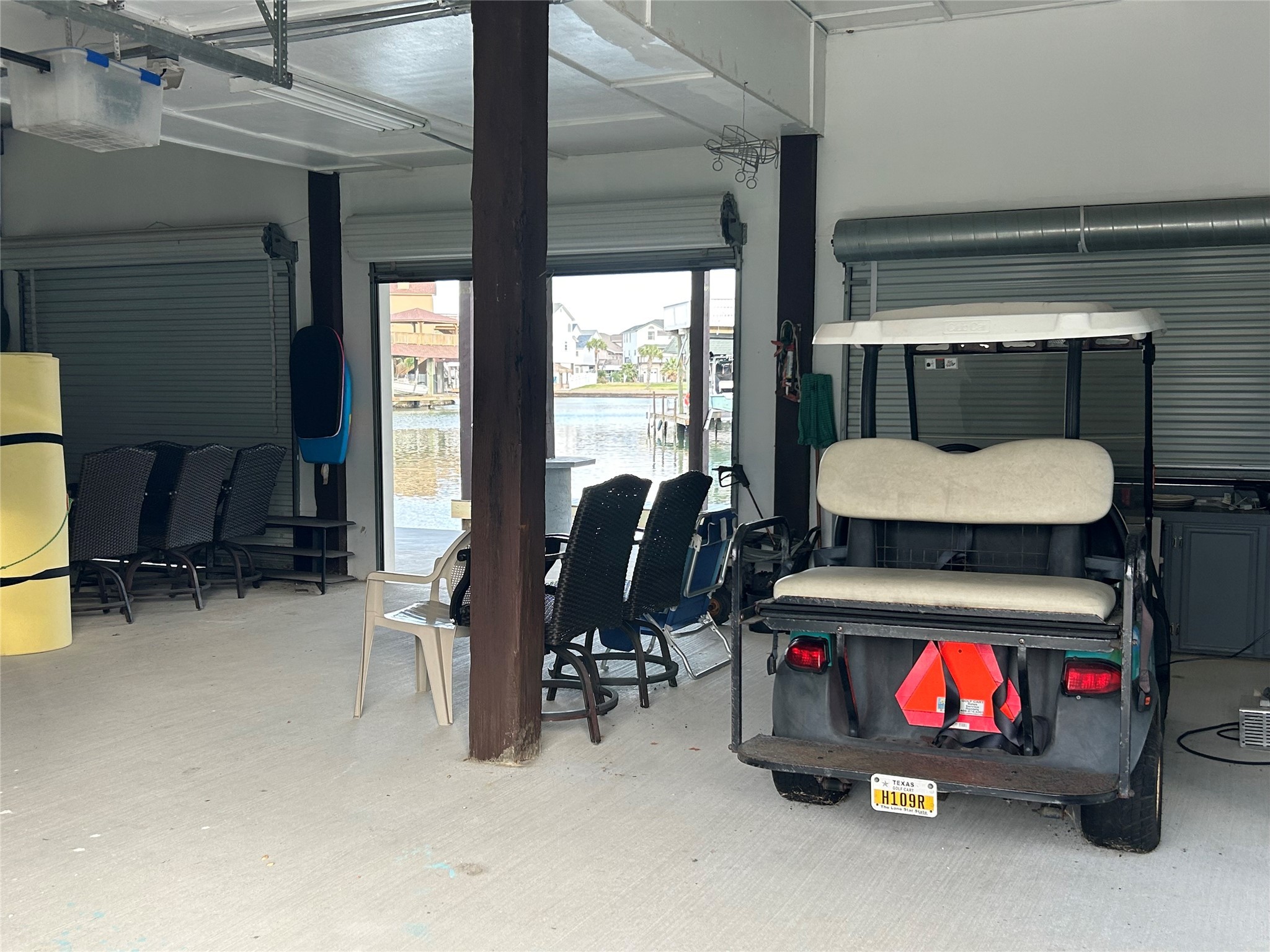 306 Isles End Road Tiki Island, TX 77554 - Photo 24 of 25 a room with furniture and a fireplace