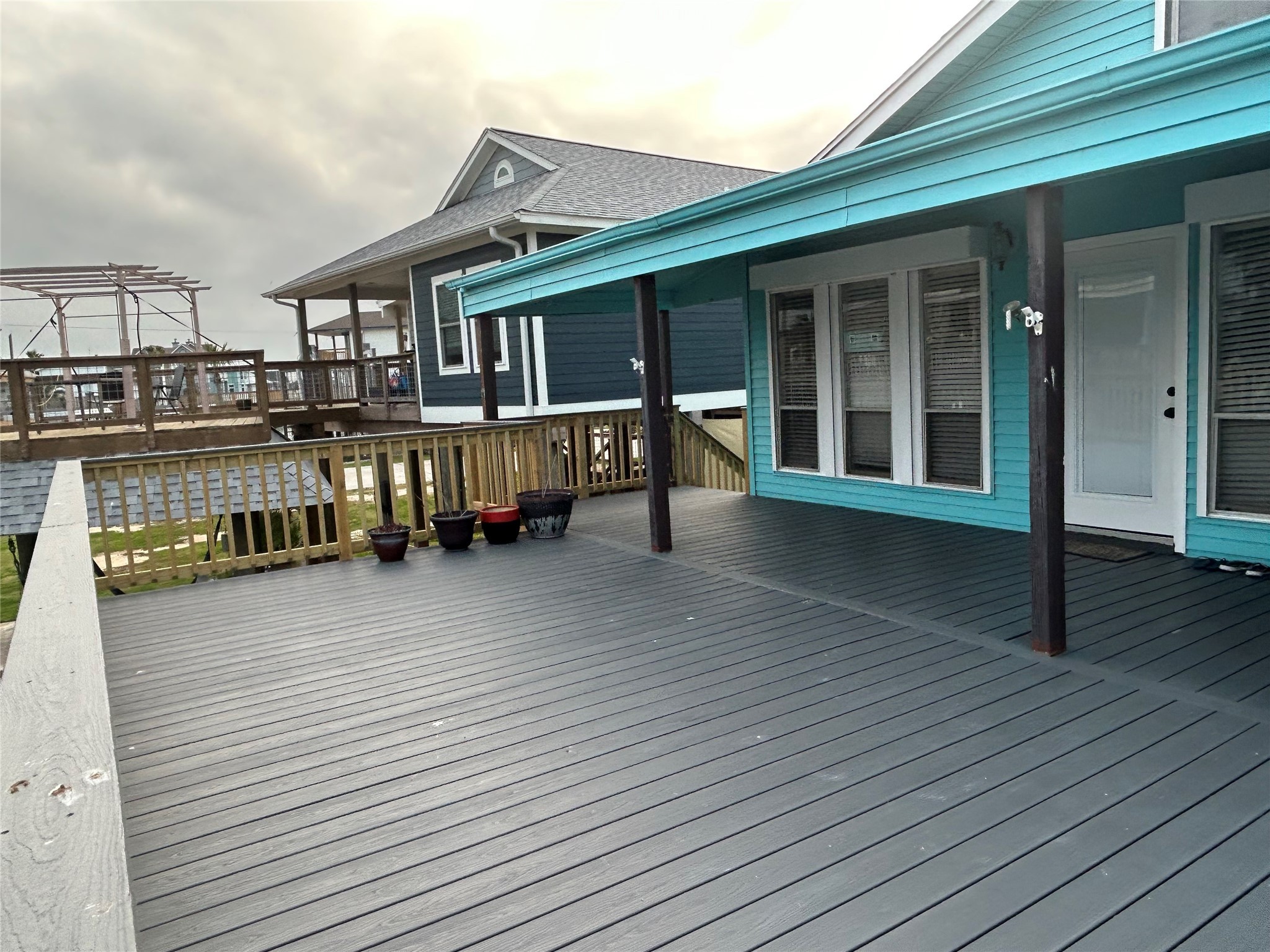 306 Isles End Road Tiki Island, TX 77554 - Photo 4 of 25 a view of a house with pool
