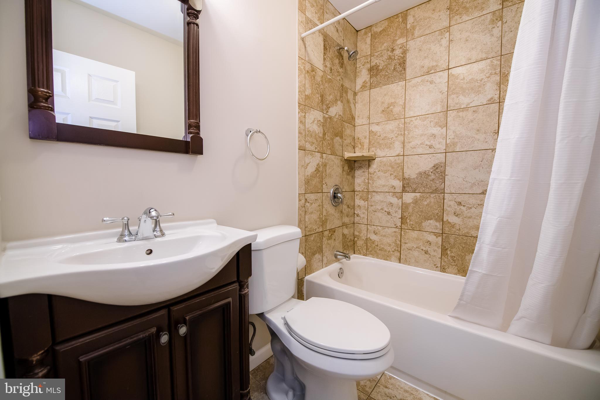 24 Crafton Road Essex, MD 21221 - Photo 15 of 28 Updated Bathroom on main level