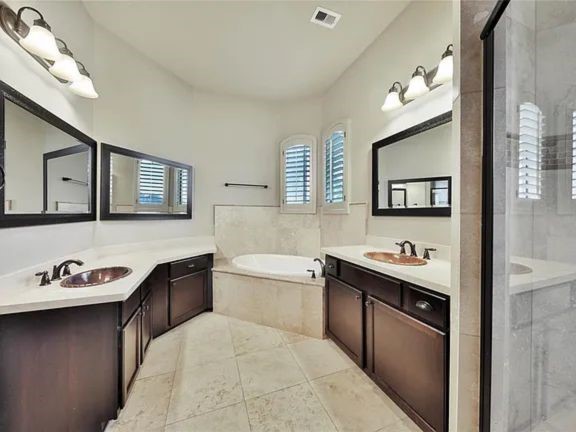 910 Snover Street, Unit A Houston, TX 77007 - Photo 15 of 26 a kitchen with stainless steel appliances granite countertop a sink stove and cabinets