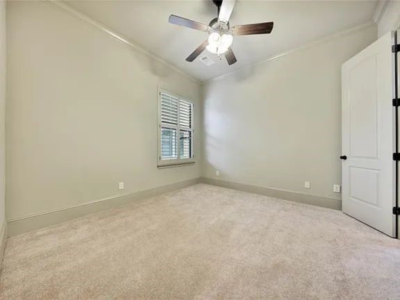 910 Snover Street, Unit A Houston, TX 77007 - Photo 17 of 26 en empty room with windows and ceiling fan