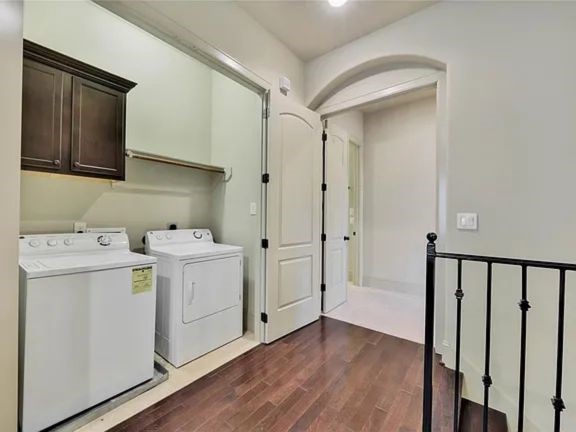 910 Snover Street, Unit A Houston, TX 77007 - Photo 22 of 26 a view of a storage & utility room with a washer dryer