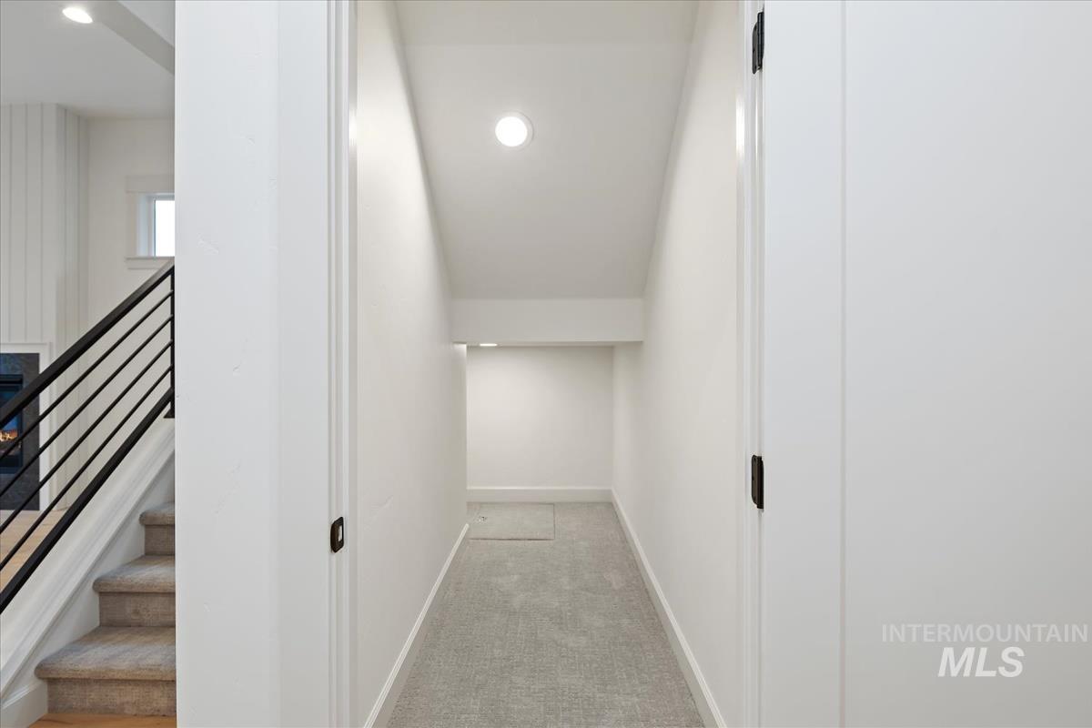 3300 North 39th Street Boise, ID 83703 - Photo 13 of 49 Corridor with light carpet and recessed lighting