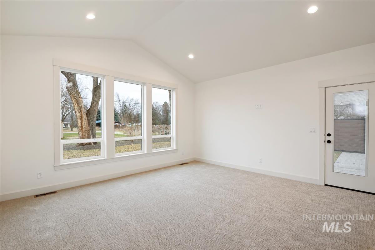 3300 North 39th Street Boise, ID 83703 - Photo 23 of 49 Empty room featuring light colored carpet and recessed lighting