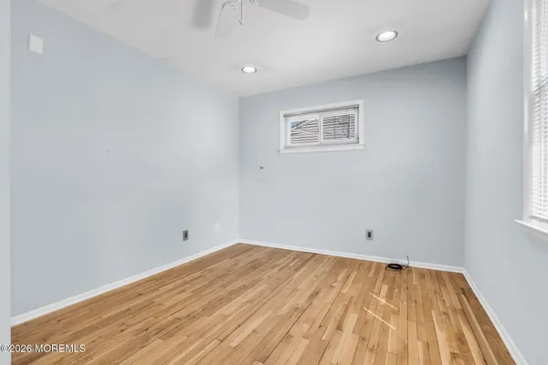 a view of storage and utility room with washer and dryer
