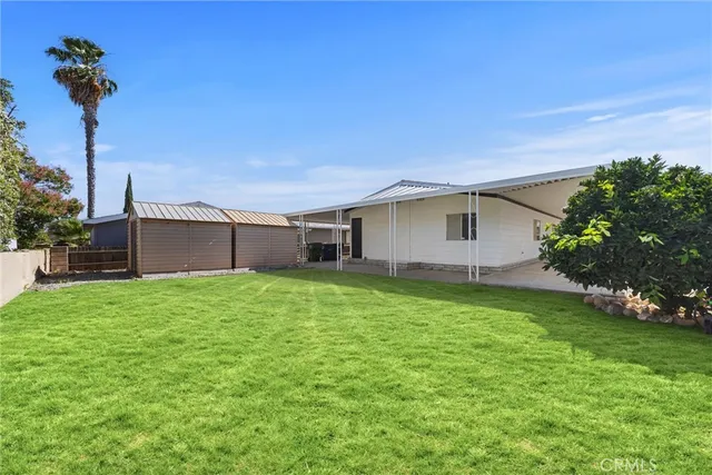 a backyard of a house with lots of green space