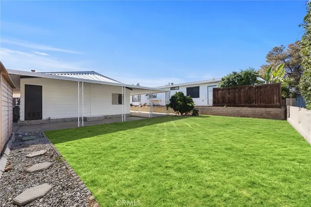 a house view with a garden space