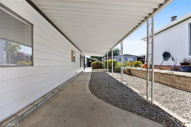 a view of a porch with furniture