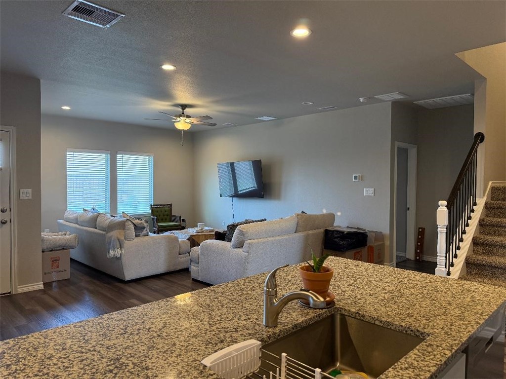 2662 Excelsior Boulevard Corpus Christi, TX 78415 - Photo 11 of 40 a living room with furniture and a flat screen tv