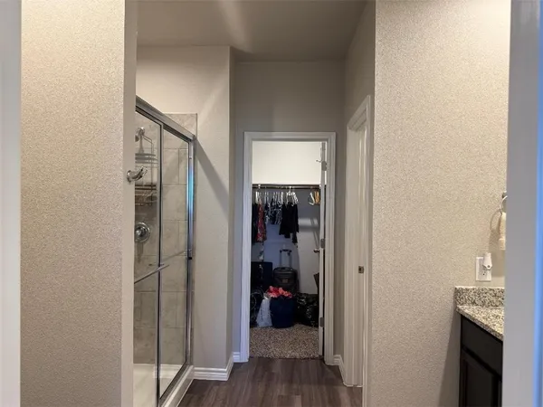 a view of a livingroom from a hallway