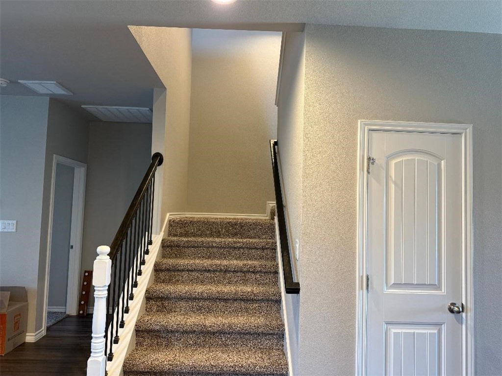 2662 Excelsior Boulevard Corpus Christi, TX 78415 - Photo 24 of 40 a view of staircase with wooden floor and staircase