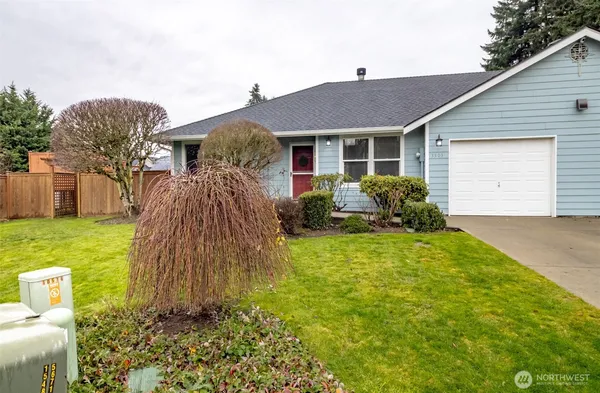 a house view with a garden space