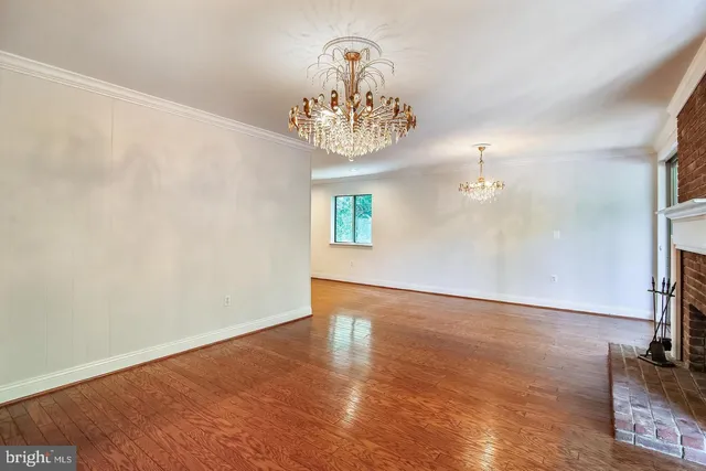a bathroom with a granite countertop sink a toilet and mirror