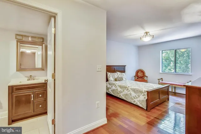 a view of a swimming pool with outdoor seating