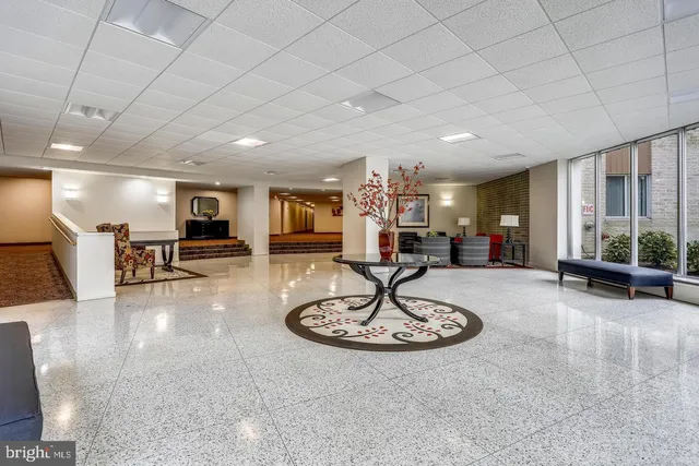 a sign that is sitting on a tree