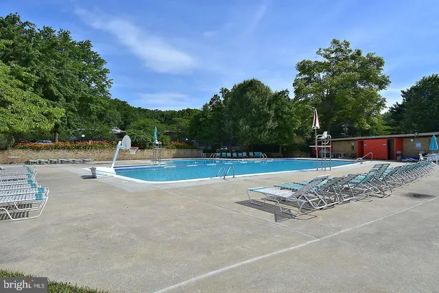 a view of a storage & utility room with two washing machine