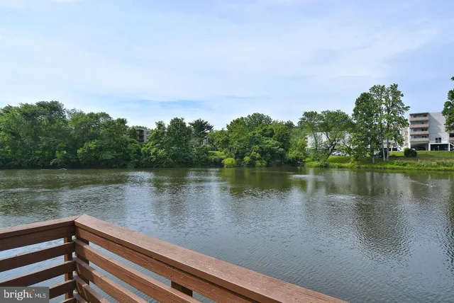 a view of street with parked cars