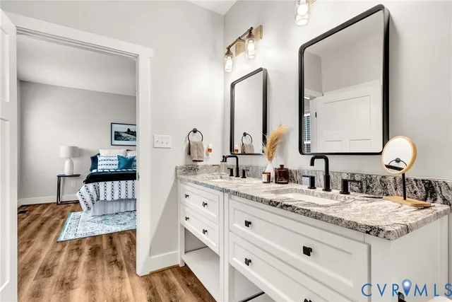 a bathroom with a sink and a mirror