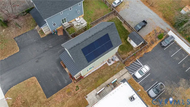 an aerial view of a house with a fireplace