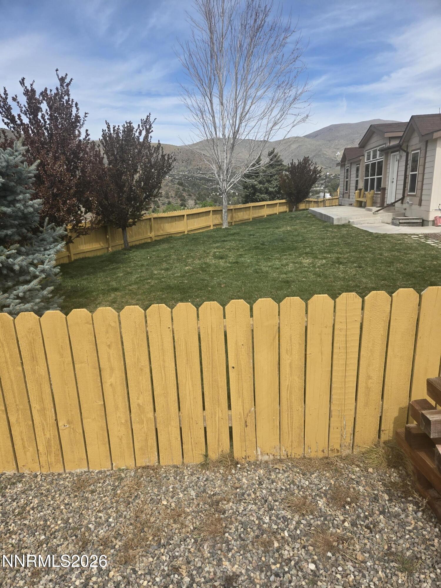 1525 Flint Road Wellington, NV 89444 - Photo 2 of 22 a view of a street with a house