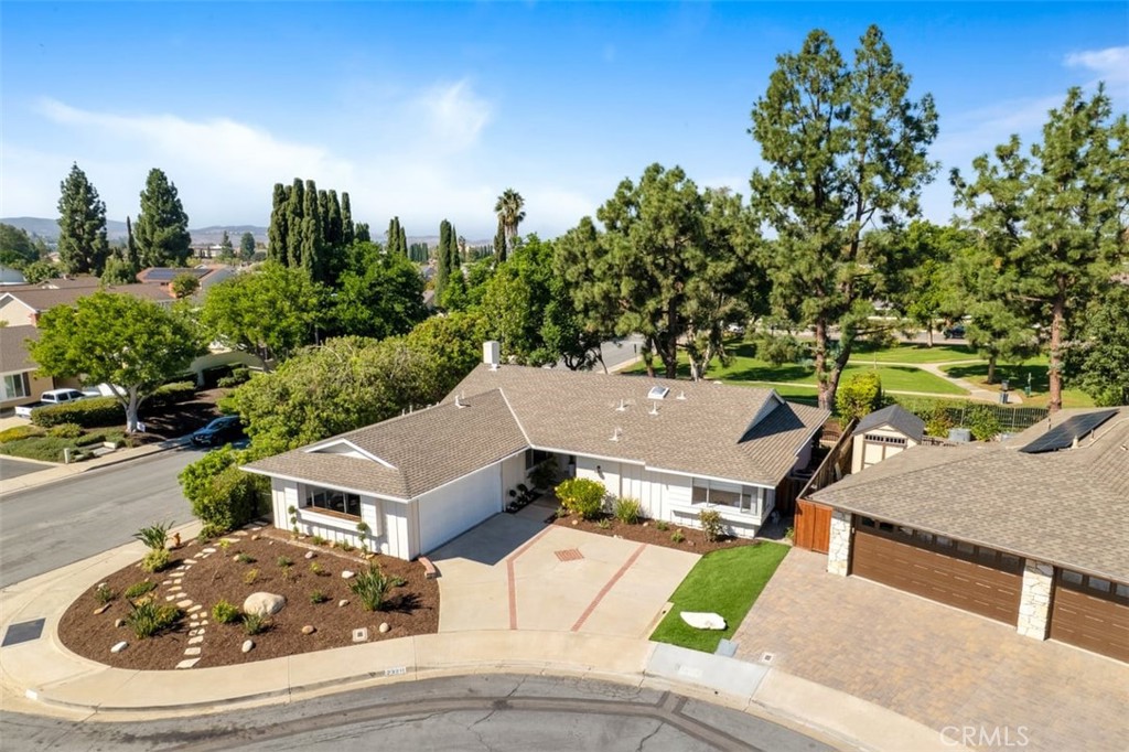 23211 Meadowbrook Circle Lake Forest, CA 92630 - Photo 1 of 50 an aerial view of a house with garden space and street view