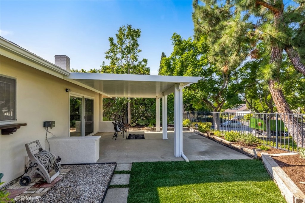 23211 Meadowbrook Circle Lake Forest, CA 92630 - Photo 13 of 50 a view of a house with backyard porch and sitting area