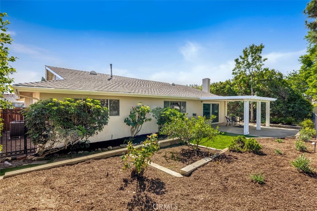 23211 Meadowbrook Circle Lake Forest, CA 92630 - Photo 14 of 50 a front view of a house with garden