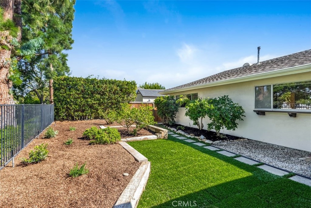 23211 Meadowbrook Circle Lake Forest, CA 92630 - Photo 16 of 50 a view of a house with a garden