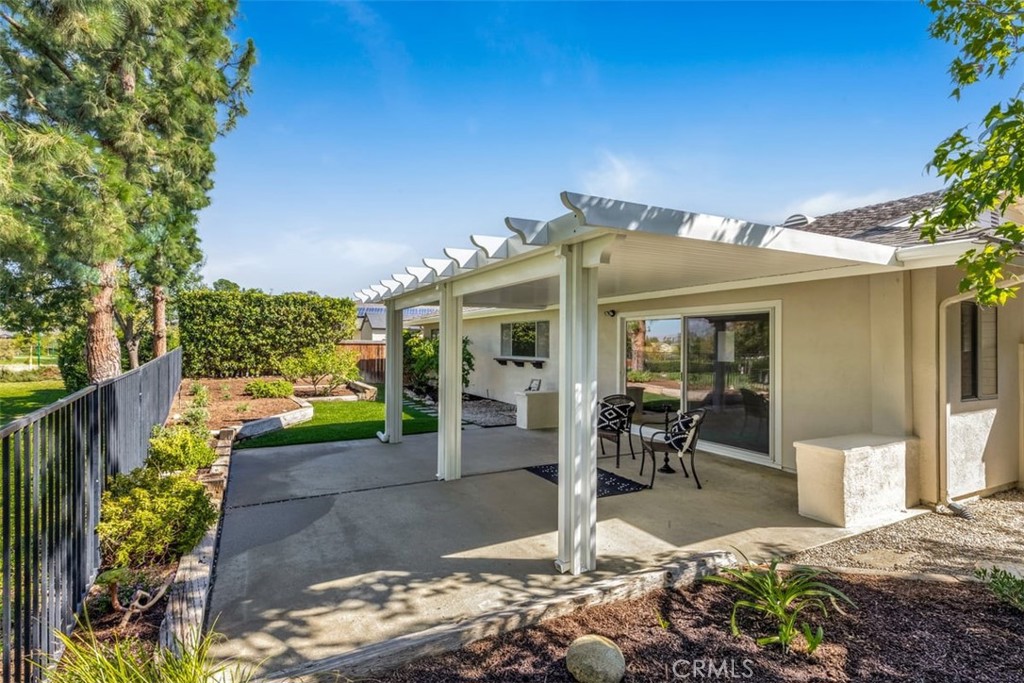 23211 Meadowbrook Circle Lake Forest, CA 92630 - Photo 18 of 50 a front view of a house with garden