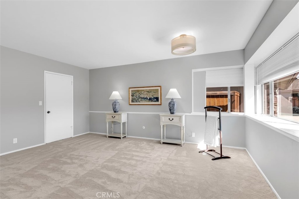 23211 Meadowbrook Circle Lake Forest, CA 92630 - Photo 23 of 50 a view of a livingroom with furniture cabinet wooden floor and window
