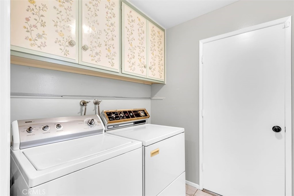 23211 Meadowbrook Circle Lake Forest, CA 92630 - Photo 31 of 50 a utility room with dryer and washer