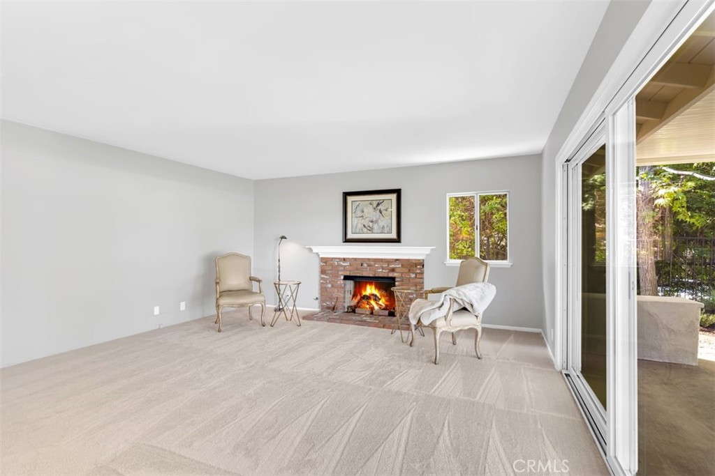 23211 Meadowbrook Circle Lake Forest, CA 92630 - Photo 7 of 50 a living room with furniture and a fireplace