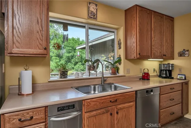 a open kitchen with a table and chairs in it